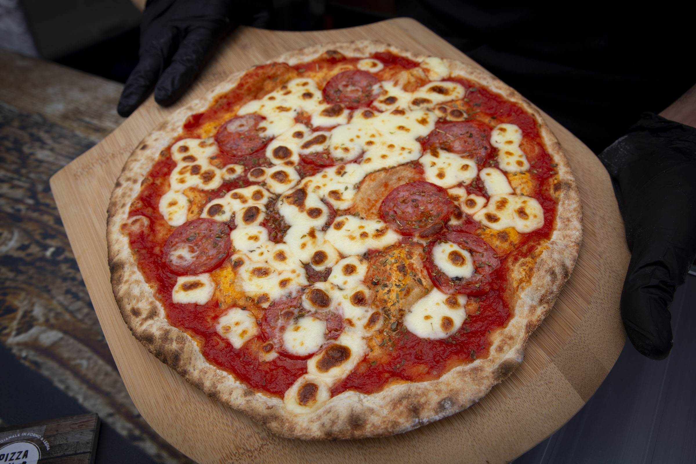 Pepperoni wood-fired pizza prepared for corporate catering in Staffordshire