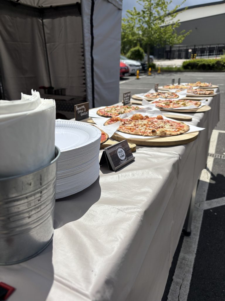 Wood-fired pizza buffet for a corporate event at Mann & Hummel