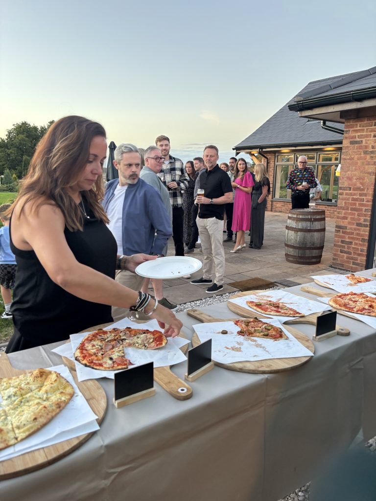 Wood-fired pizza buffet at a 50th birthday party at Blithfield Lakeside Barns