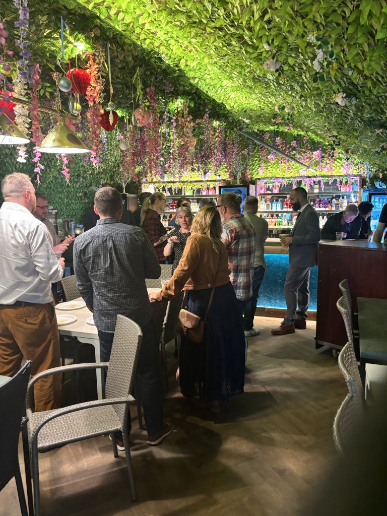 Guests enjoying an evening wedding celebration at Fallow Forest in Cannock